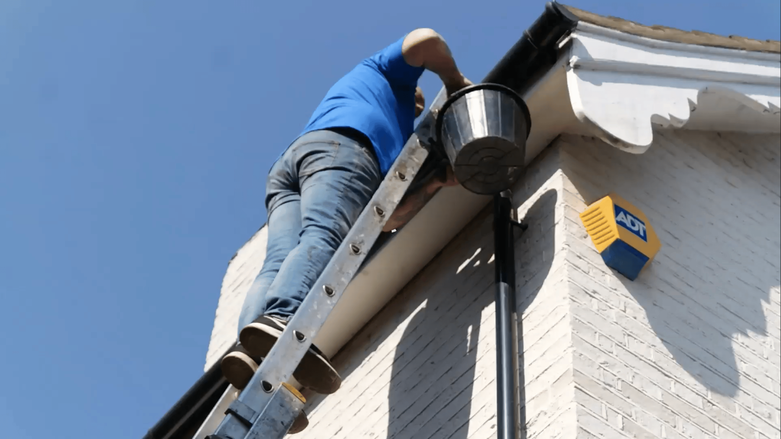 gutter clear by hand and ladder