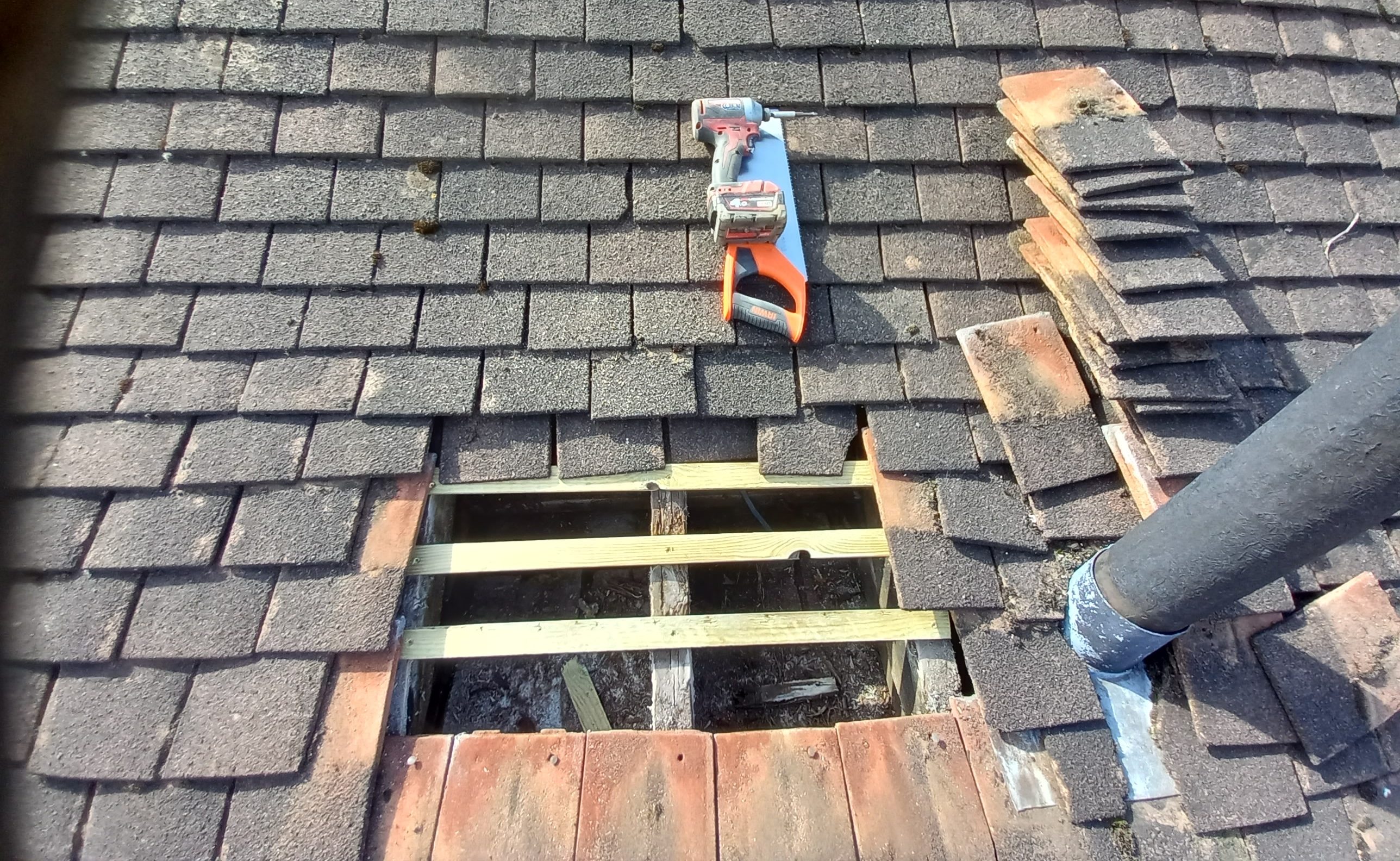 Images of tools and new tiles for a roof repair