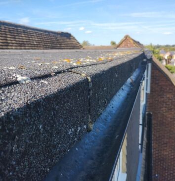 The inside of a UPVC black gutter.