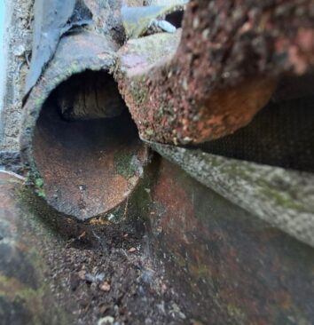 The inside of a house rain gutter.