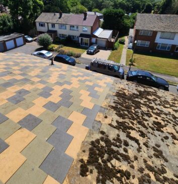 A roof that is half clean and half dirty.