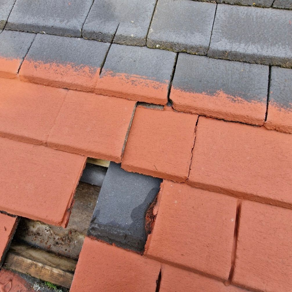 Missing roof tiles.