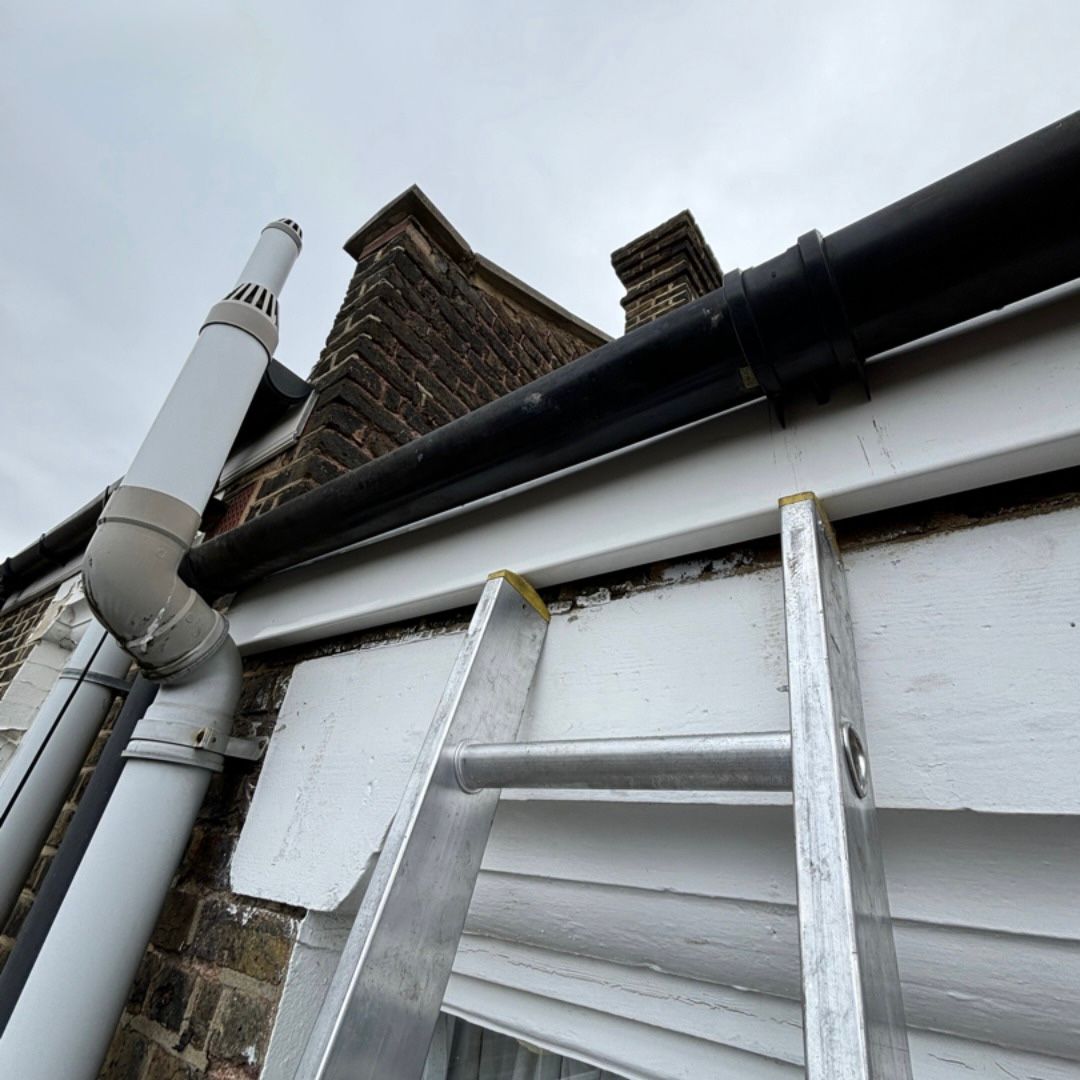 A new white fascia board that has been installed.