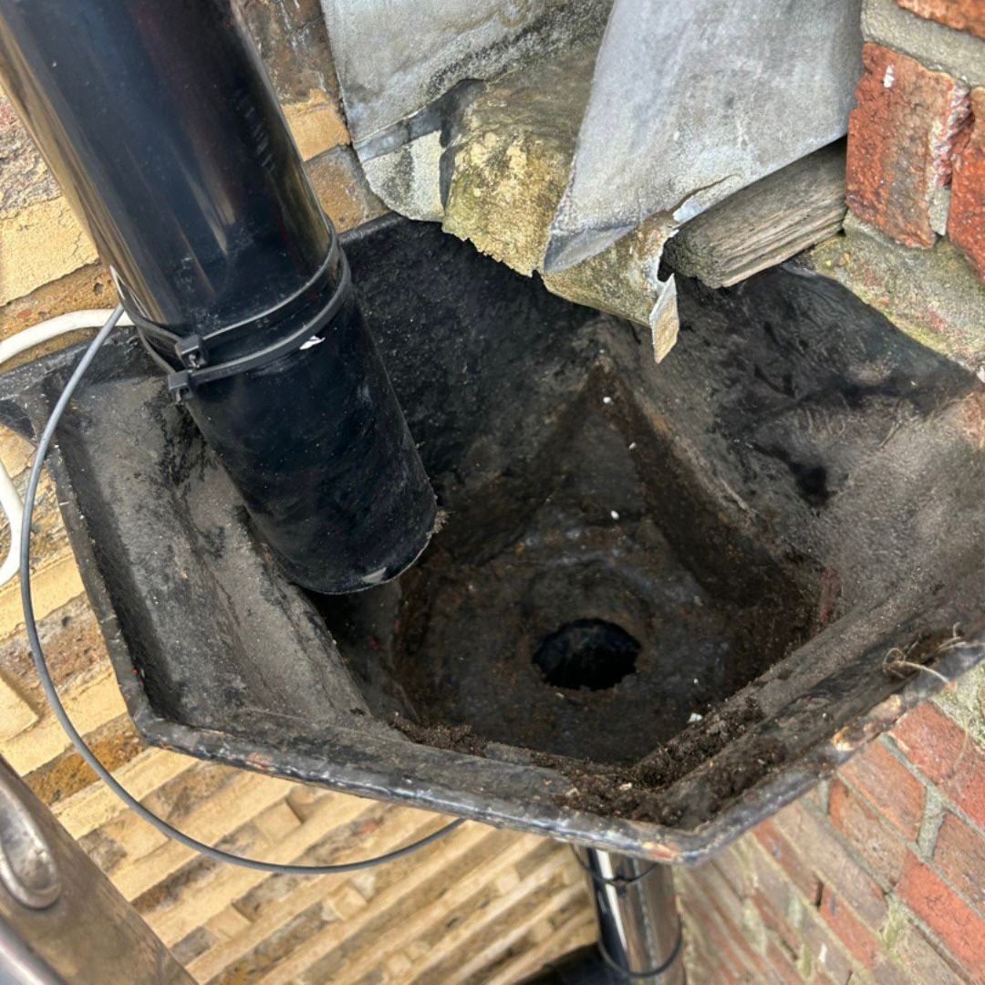 An after photo of a downpipe that has been unblocked.