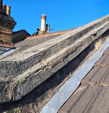 A before image showing rendering needed on a roof.