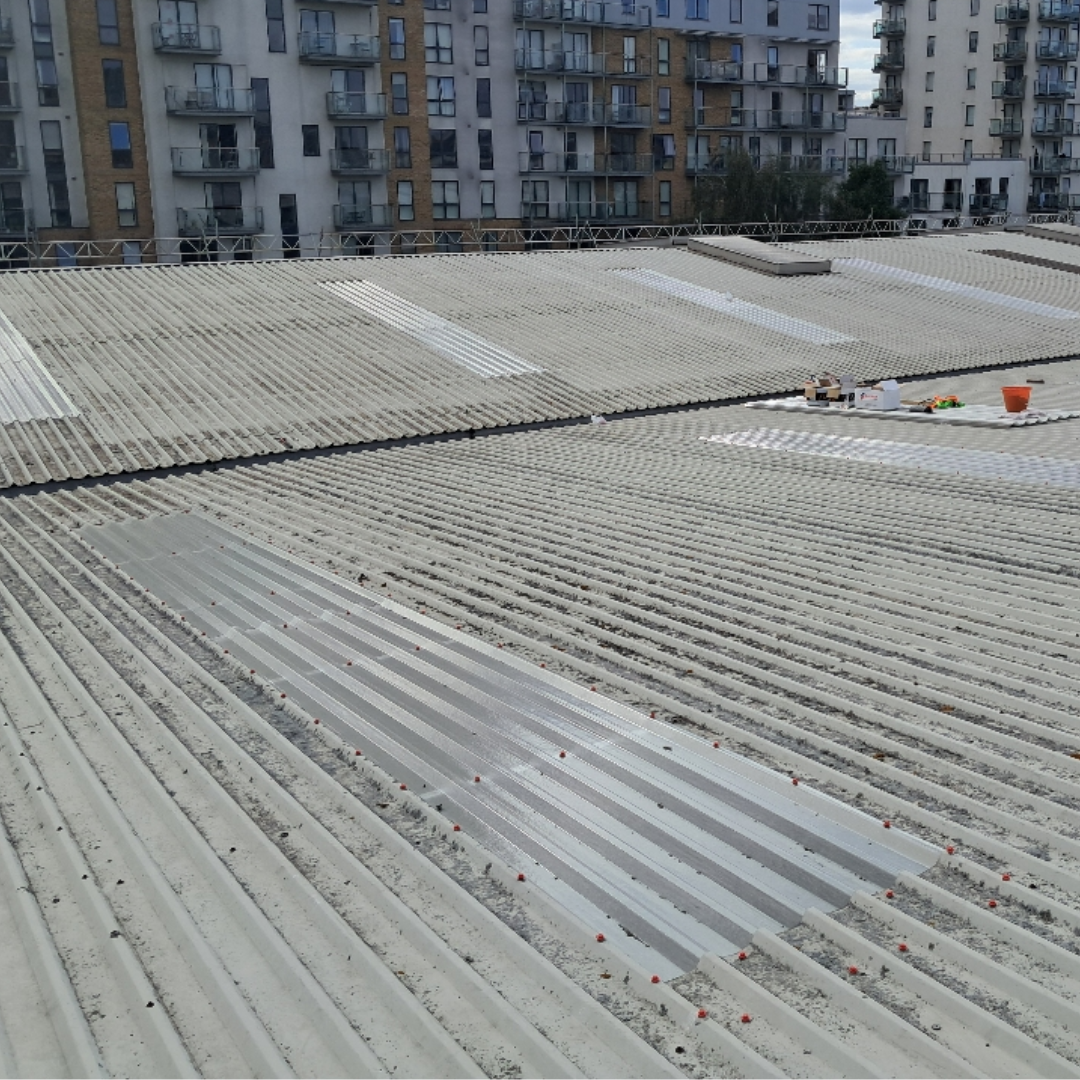Skylights that have been replaced on a commercial building.