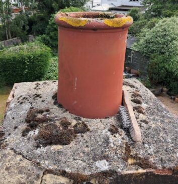 A before photo of a chimney before it is repaired.