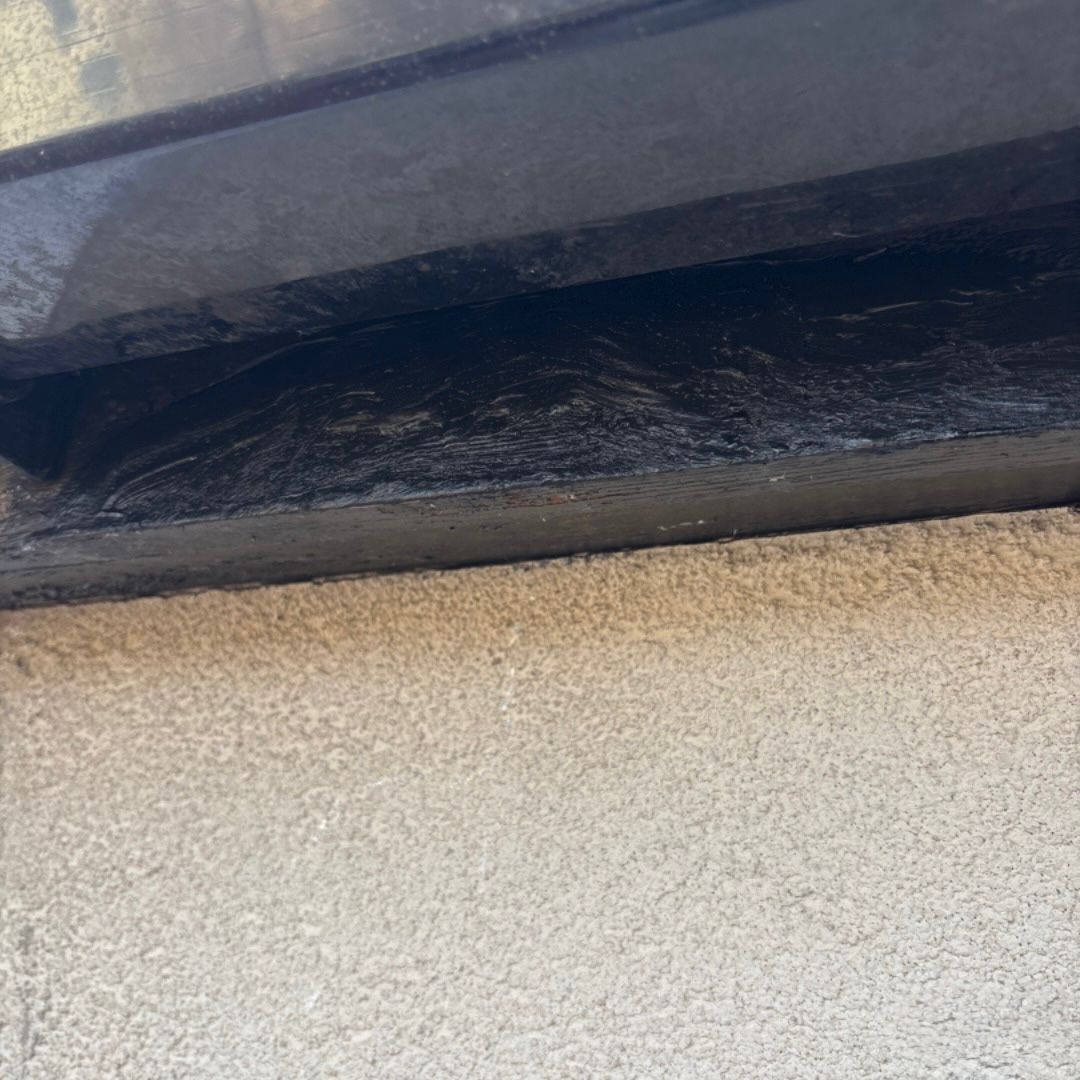 An after photo where a black fascia has been repaired.