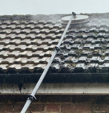 Photo of a roof being professionally cleaned.